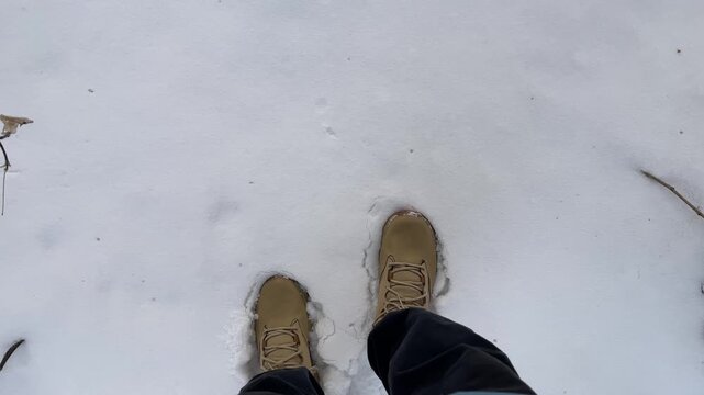 Walking in Beige Winter Boots on Fresh Puffy Snow