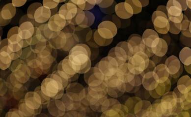 Golden bokeh light effect creating a warm and romantic atmosphere, perfect for festive or celebration background