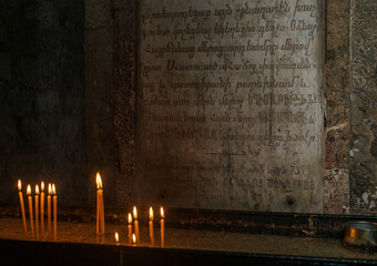 candles in the dark and oldest church