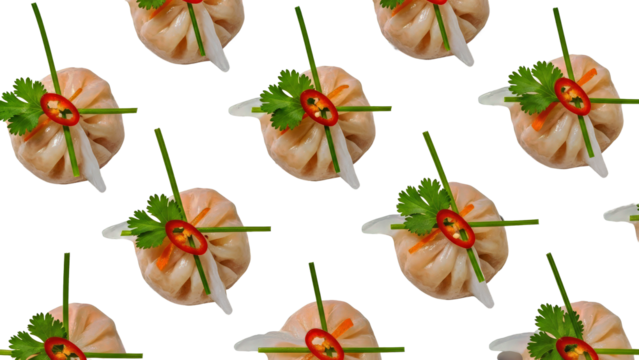Fresh Steamed Dumplings Platter with Cilantro and Chili Garnish