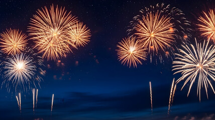 Golden fireworks illuminating the night sky with bursting light and sparkling trails in a celebration