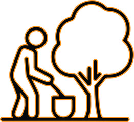 Person watering a young tree from a bucket