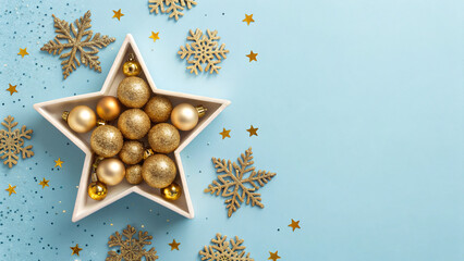 A star-shaped bowl holds shiny gold and glittery ornaments, surrounded by festive snowflakes and golden stars on a soft blue background christmas greeting card with copyspace