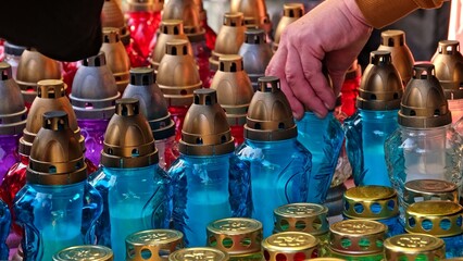 Glass Votive Candle Lanterns Sold at Outdoor Market Stand by Christian Catholic Cemetery on All Saint Day