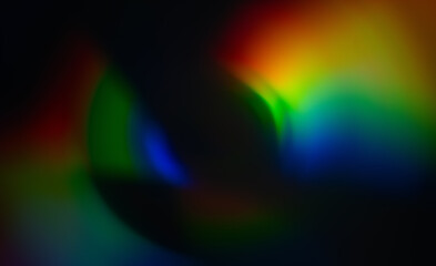 Gradient rainbow on dark background. Ideal for use as a backdrop for a technology theme.
