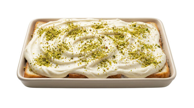 PNG cut out isolated background. An overhead studio shot of a rectangular dish filled with Aish El-Saraya, a traditional Middle Eastern dessert.