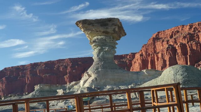 El Hongo rock formation standing prominently in Ischigualasto Provincial Park, San Juan, Argentina, showcasing unique geological erosion creating a desert landscape wonder, camera slow panning
