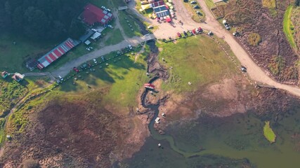 Overhead drone capture of camping zones and outdoor activities in Lagunas de Zempoala National Park
