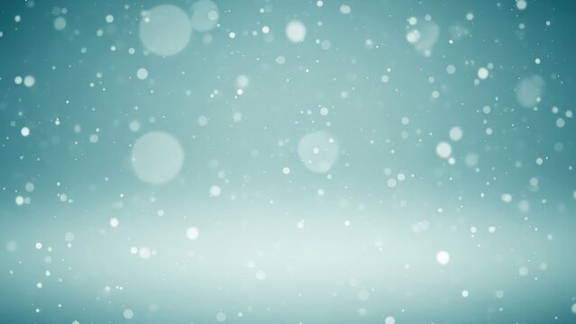 Snowflakes falling against a blue background.