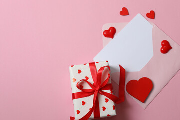 Valentine's Day card with hearts, on a pink background.
