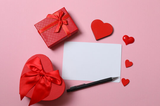 Valentine's Day card with hearts, on a pink background.
