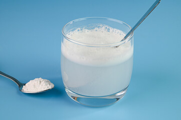 Mixing baking soda in water.