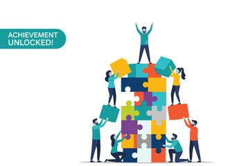 A team of people collaborates to build a colorful puzzle tower, symbolizing teamwork, success, and achievement.