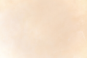 Soft textured light peach surface with subtle grain and gradient light effects