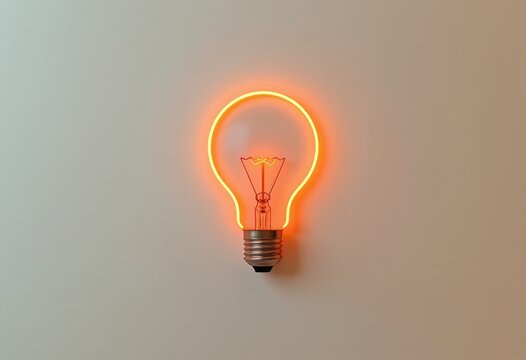 Orange neon light bulb on neutral wall