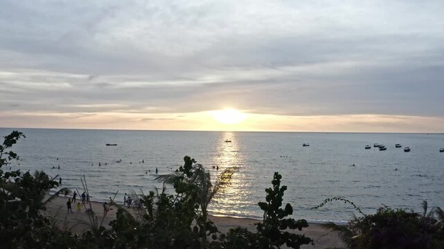 Zhanjiang Xuwen Seaside Sunset Over Ocean with Fishing Boats China Coastal Landscape