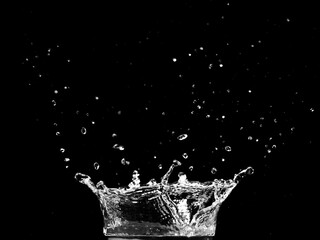 Captivating water crown in perfect motion, showing splash art with water drops and clean liquid. It captures the essence of purity and refreshing water
