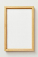 Obraz premium Wooden Picture Frame on Wall: A minimalist composition showcasing a classic wooden picture frame, ready to display a cherished memory or artwork on a neutral wall.