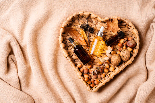 Skincare and cosmetic products in wicker heart tray