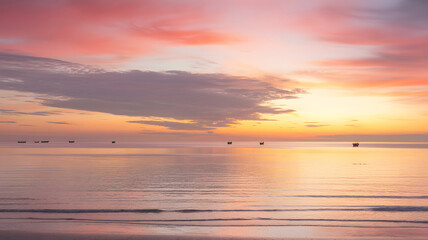 Obraz premium Serene Seascape at Pink and Orange Sunset