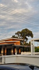Modern city street at night, with building architecture and the dark sky above