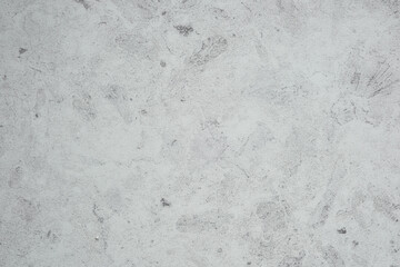 Surface texture of concrete with light gray tones and subtle detailing