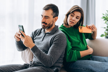 Pregnant woman spying on partner's mobile phone conversation