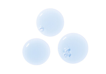 round drops of serum gel texture cosmetic products on a white background top view