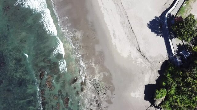 the beauty of the white sand beach from above