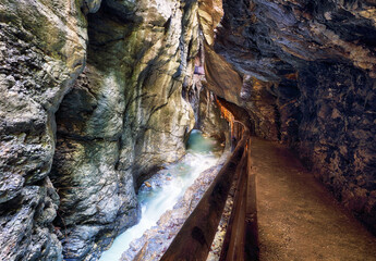 Summer Liechtensteinklamm gorge with stream and waterfalls in Austria Alps