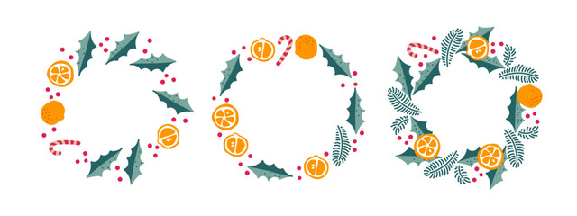 Festive wreath set. Vibrant New Year's designs with oranges, mandarins, mistletoe branches, candy canes for holiday cards, decorations.Three Christmas wreath designs. Round frame set with copy space.