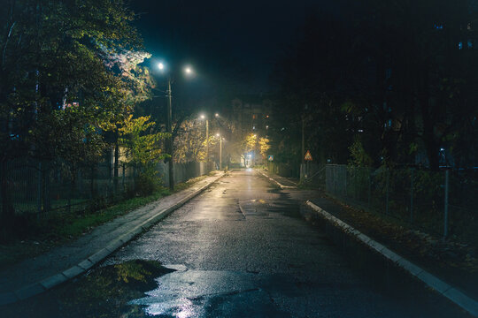 A small Balkan street at night in autumn