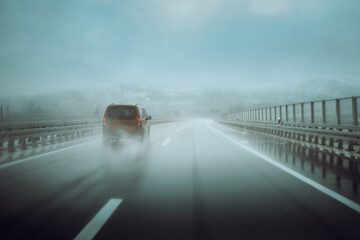 Fototapeta premium Rainy and foggy weather on the highway