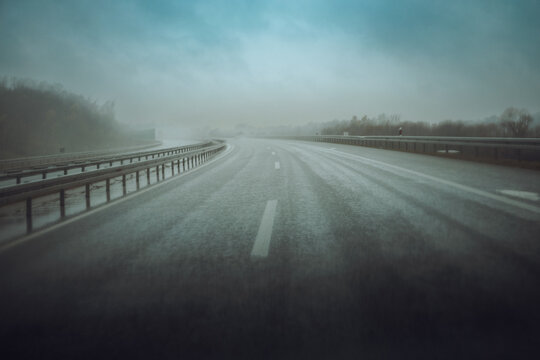 Rainy and foggy weather on the highway