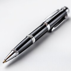 Fototapeta premium Elegant Black and Silver Pen on White Textured Background, Close-up