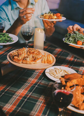 Diversity, dinner and group of people toast celebration together at party. Friends, happy and celebrate with food, wine and friendship for love, support and cheers champagne at business function