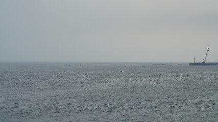 The beautiful sea view with the cloudy sky as background in summer