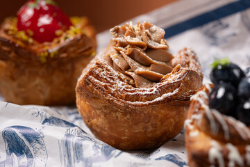 Flaky pastry topped with hazelnut cream and powder.
