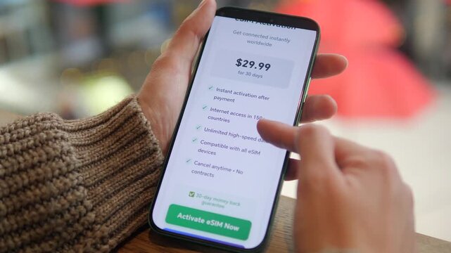 A consumer carefully reads the details and cost associated with a digital eSIM subscription before purchasing. This scene highlights the importance of understanding service terms, ideal for content