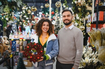 Couple shopping for christmas holiday decorations