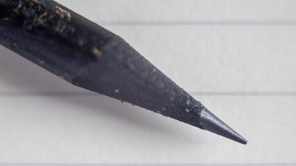 A focused close-up of a pencil&rsquo;s graphite point