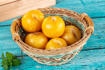 Raw ripe sweet yellow plums