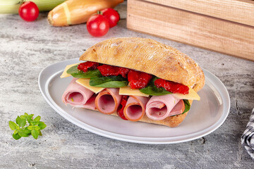 Ciabatta with mortadella, tomato, cheese and spinach