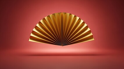 Elegant golden fan displayed with subtle lighting and a deep red backdrop, creating a sophisticated and luxurious aesthetic