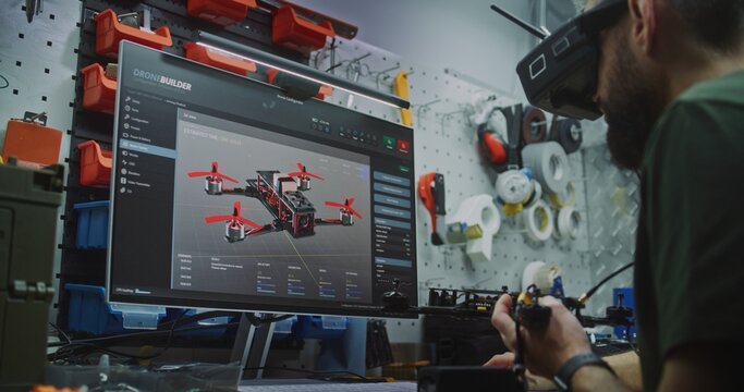 Engineer Programming FPV Drone Parameters on Computer Software. Man Configures and Programs Drone Using Specialized Software Showing 3D Model. Digital Configuration and Fine Tuning For Optimal Flight.