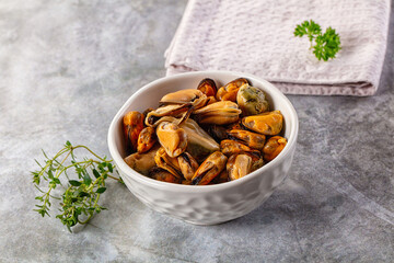 Peeled mussels heap in the bowl