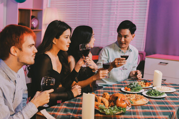 Diversity, dinner and group of people toast celebration together at party. Friends, happy and celebrate with food, wine and friendship for love, support and cheers champagne at business function