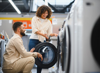 Couple exploring options for new home appliances