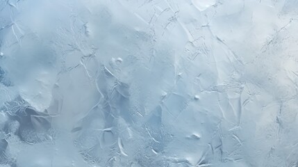 Obraz premium Abstract icy texture with a cool blue hue, featuring intricate patterns and a frosty appearance.