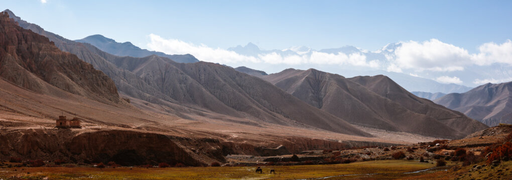 Panoramic of arid valley and mountains, Upper Mustang region, Nepal